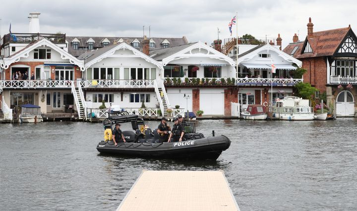 Police patrol the river during day three of the 2017 Henley Royal Regatta alongside the river Thames