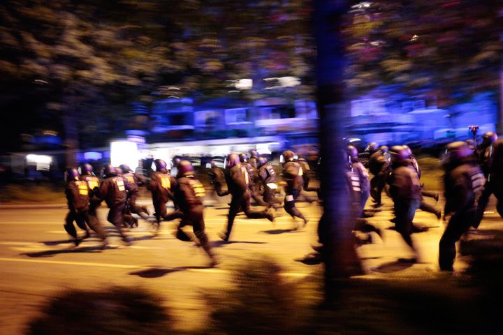 German anti-riot police rush towards protesters in Hamburg 