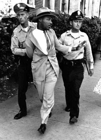 Martin Luther King Jr. arrested outside a courtroom, 1958