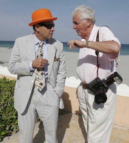 Bruce Helander speaks with Harry Benson prior to his portrait session for Benson’s book, “Palm Beach People,” on South Ocean Boulevard and Worth Avenue (2013). 