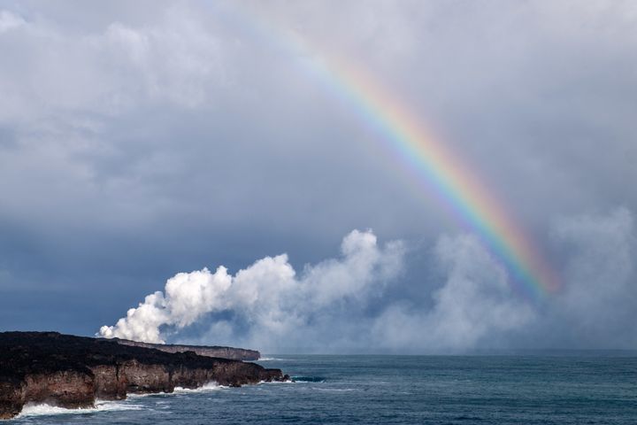 Where the lava meets the icy Pacific seas in Hawai’i Volcanoes National Park... and fittingly, a rainbow. 
