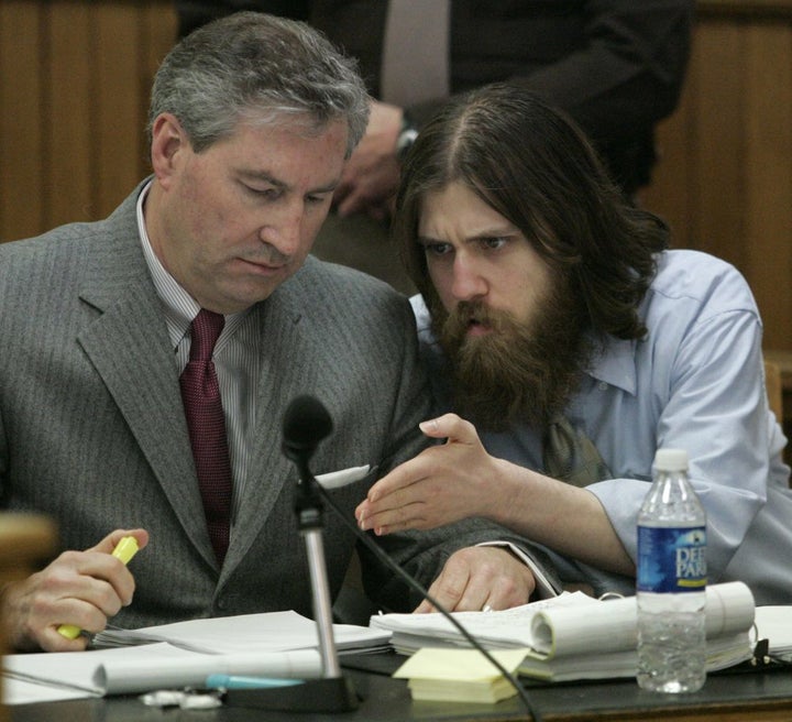 Convicted murderer William Morva, right, talks with his attorney Tony Anderson, in Washington County Circuit Court in Abingd