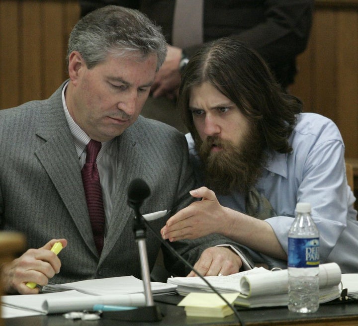  Convicted murderer William Morva, right, talks with his attorney Tony Anderson, in Washington County Circuit Court in Abingdon Va. March 13, 2008. 