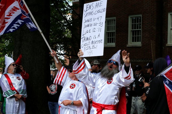 Members of the Ku Klux Klan rally in support of Confederate monuments in Charlottesville, Virginia, U.S. July 8, 2017. (REUTERS/Jonathan Ernst)