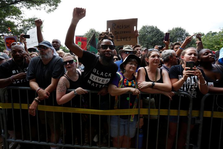 Counter-protesters shout at members of the Ku Klux Klan, who are rallying in opposition to city proposals to remove or make changes to Confederate monuments, in Charlottesville, Virginia, U.S. July 8, 2017. (REUTERS/Jonathan Ernst)