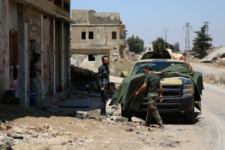 Free Syrian Army fighters are seen in Quneitra, Syria July 8, 2017. (REUTERS/Alaa al-Faqir)