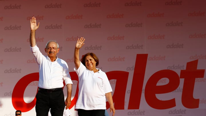 Kemal Kilicdaroglu and his wife Selvi greet people during a rally to mark the end of his 25-day long protest.