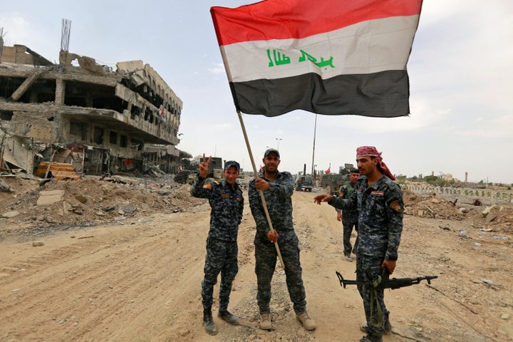 Iraqi Federal Police celebrate in the Old City of Mosul, Iraq July 8, 2017. 