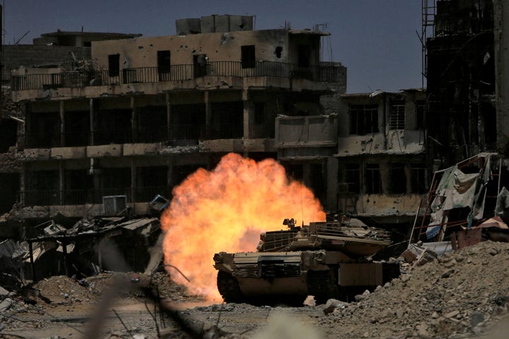 A tank fires at Islamic State militants in the old City of Mosul last week. The UN estimates it will take at least $1 billion