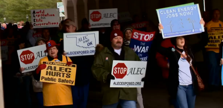 <p>People rally outside 2013 ALEC meeting in Oklahoma.</p>