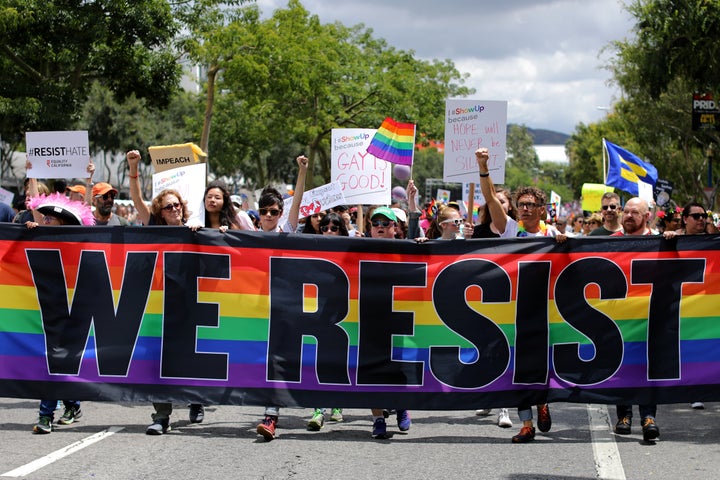 Members of the LGBTQ community protest President Donald Trump at the 2017 Pride Parade in Los Angeles.