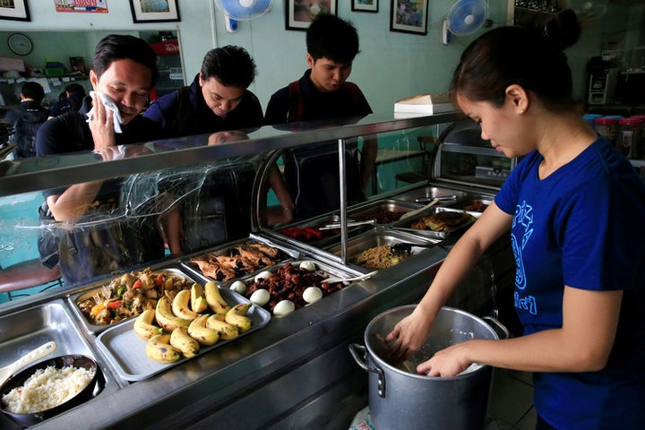  Small businesses, like this restaurant in the Philippines, should be encouraged to take part in the UBI scheme. 