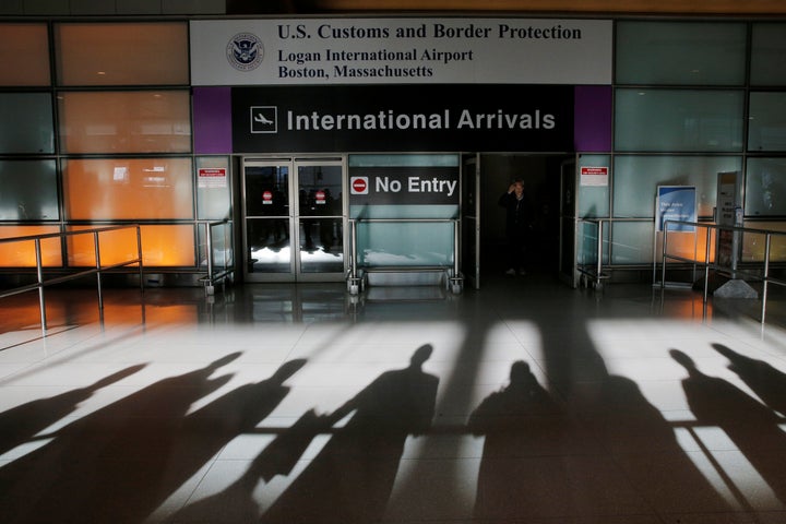 An international traveler arrives at Logan Airport in Boston, Massachusetts.