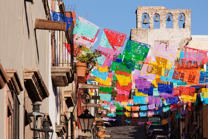 Colorful flags decorate the streets in San Miguel.