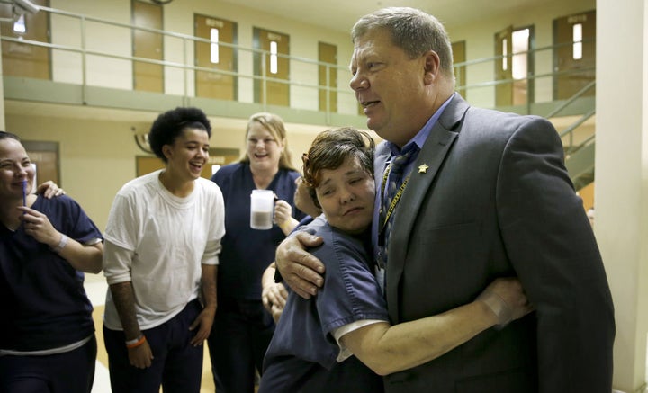 Sheriff Karl Leonard with participants of his womens Heroin Addiction Recovery Program HARP.