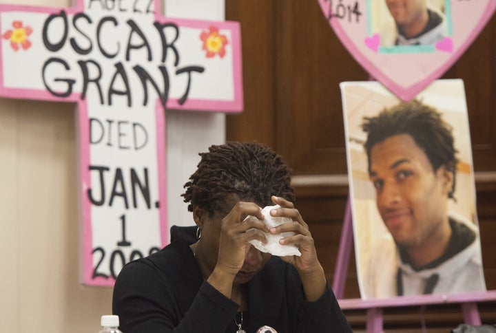 Tressa Sherrod cries after telling the story of her son, 22-year-old John Crawford III, who was shot and killed by police in an Ohio Walmart, Dec. 10, 2014.