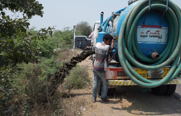 A photo taken in India by student researcher Sharada Prasad shows a truck dumping human feces on the side of the road. "Thus sewage does not only come from pipes but also trucks emptying pit latrines and septic tanks," Drechsel wrote in an email. "One such truckload is like 5,000 cases of open defecation on a spot."