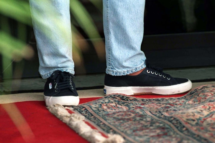She paired the sneakers with light-wash jeans.