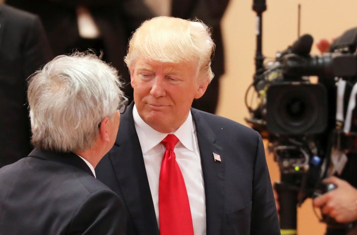 President Donald Trump talks to European Commission President Jean-Claude Juncker at the G20 meeting in Germany on July 8.