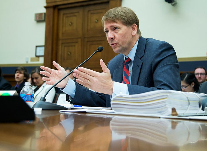 <p>Consumer Financial Protection Bureau Director Richard Cordray testifies on Capitol Hill in 2013.</p>