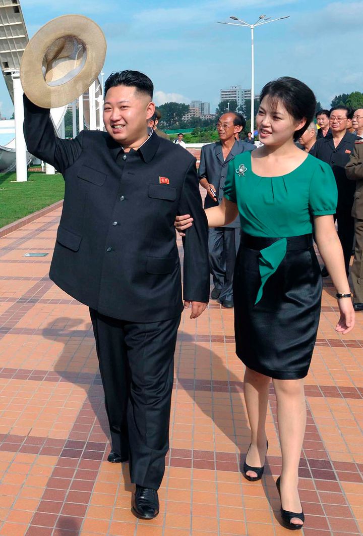 Kim and Ri pictured at a North Korean theme park in 2012 