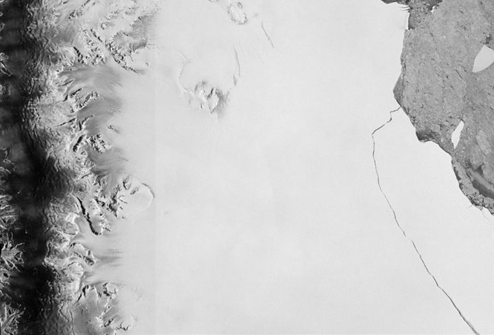 A section of an iceberg – about 6,000 sq km – broke away as part of the natural cycle of iceberg calving off the Larsen-C ice shelf in Antarctica in this satellite image released by the European Space Agency on July 12, 2017.