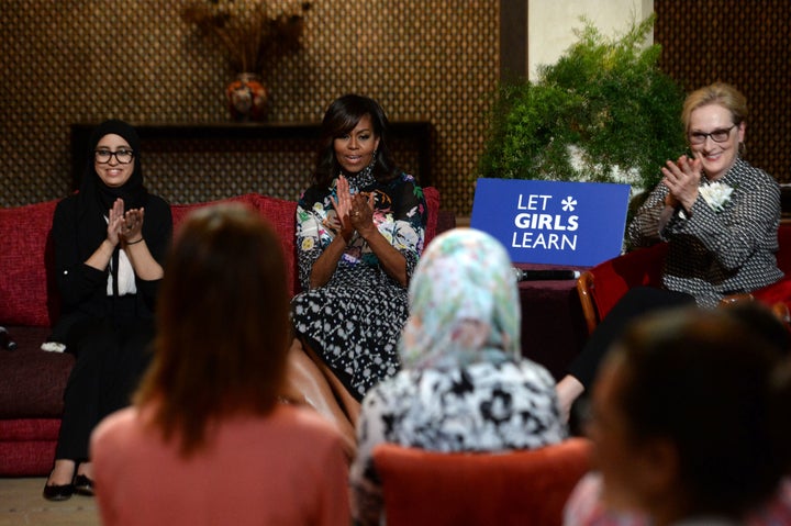 Former first lady Michelle Obama and actress Meryl Streep applaud as they meet with Moroccan young women following the 'Let Girls Learn' Program on June 28, 2016