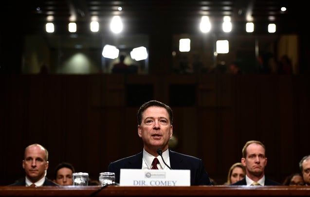 Former FBI Director James Comey testifies during a US Senate Select Committee on Intelligence hearing on Capitol Hill in Washington, DC, June 8, 2017.
Fired FBI director James Comey took the stand Thursday in a crucial Senate hearing, repeating explosive allegations that President Donald Trump badgered him over the highly sensitive investigation Russia's meddling in the 2016 election. / AFP PHOTO / Brendan Smialowski (Photo credit should read BRENDAN SMIALOWSKI/AFP/Getty Images)