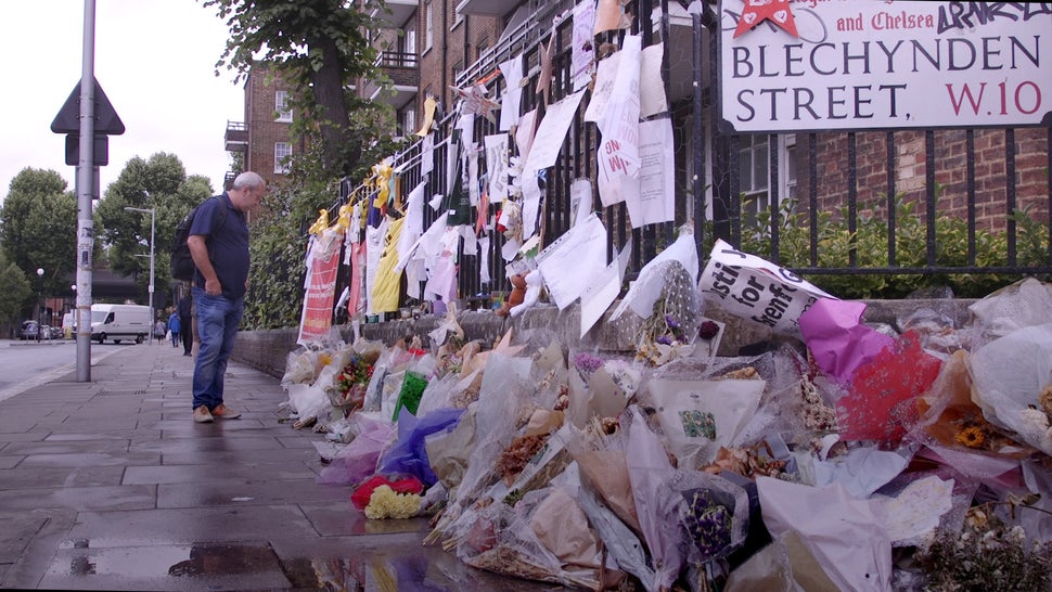 Flowers left in North Kensington on Blechynden Street pictured this week