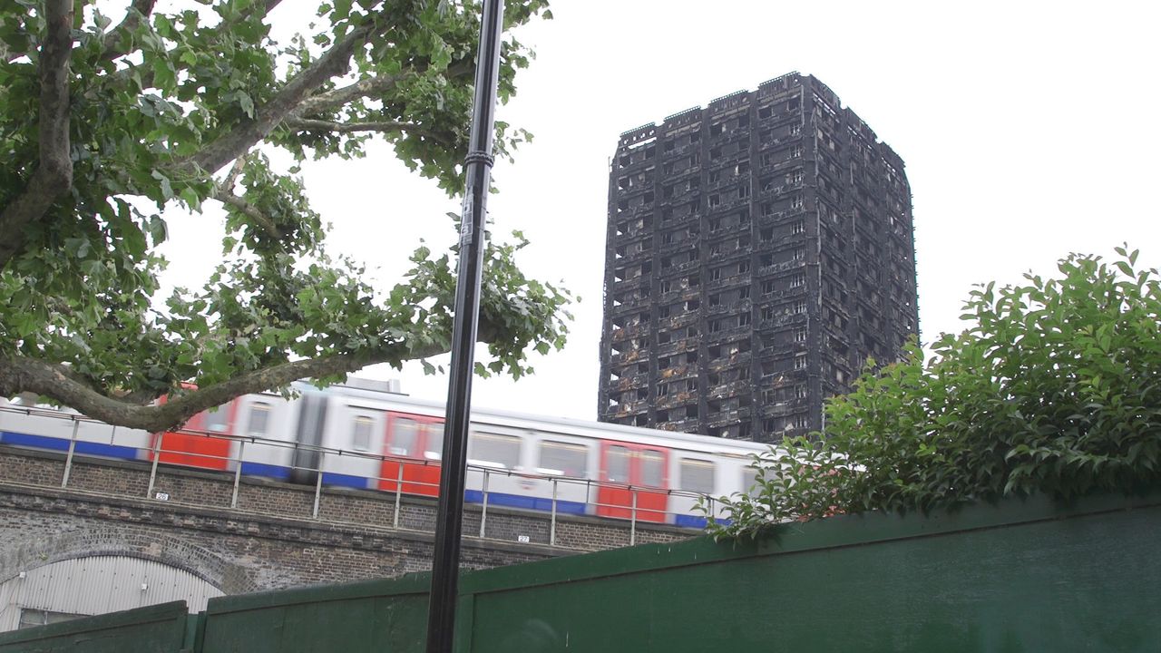 Tube trains continue to run near the burnt out remains of Grenfell Tower