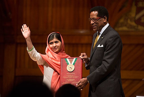 <p>Dr. Allen Counter recognizes Malala with the Harvard Foundation Award in 2013</p>