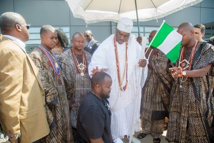 Nigerian King “The Ooni of Ife, Oba Adeyeye Enitan Ogunwusi (Ojaja II)” during his historical visit to the U.S, flagging off Pilot Lola (First African to fly around the world solo) according to Nigerian tradition, as he transcends. {June 26th 2016}