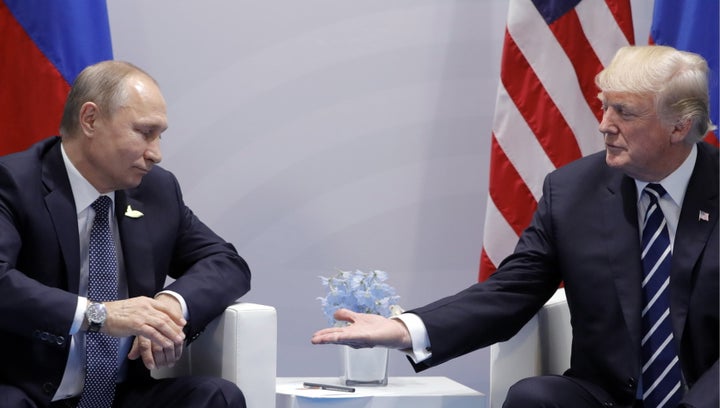 Russia's President Vladimir Putin and President Donald Trump hold a meeting on the sidelines of the G20 summit in Hamburg, Ge