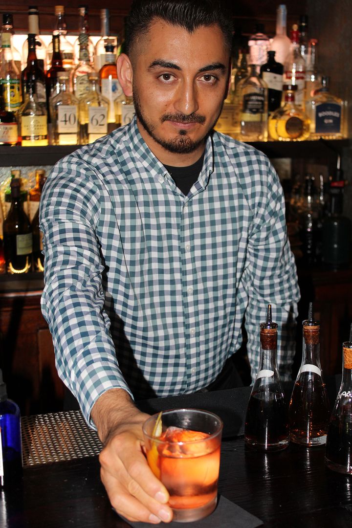 1886 “Bar Star” on the rise Luis Nava serving up one of his killer summer cocktails. 