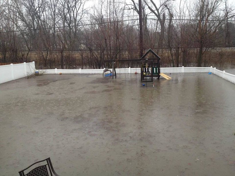 Flooding outside the home of Kendra Scudder Thompson, an Elmhurst, Ill., resident and a member of Stop Elmhurst Flooding.