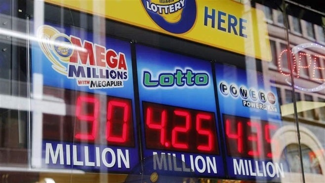 Signs display lottery jackpots in Chicago. States are constantly revising their games to keep up interest and revenue.