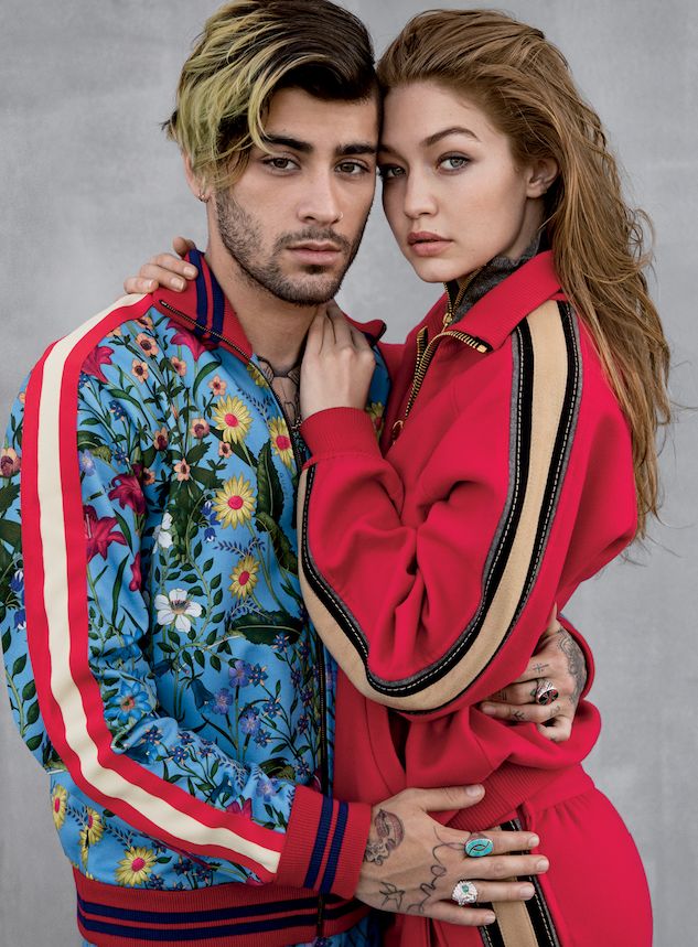 Gigi wears Marc Jacobs track jacket, sweater, and pants. Zayn wears Gucci track jacket and pants. Foundwell rings.