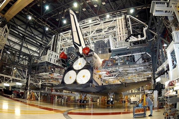  Space Shuttle Atlantis undergoing maintenance at Kennedy Space Center in 2003. 