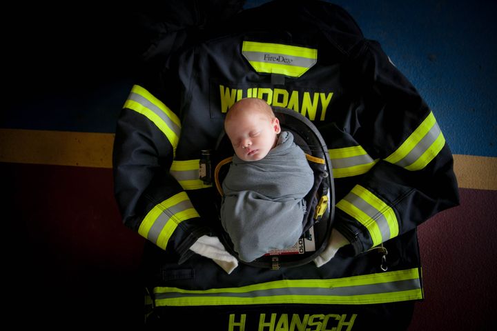 Baby Hudson's newborn photos paid tribute to his firefighter dad.