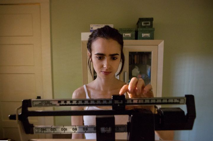 Lily Collins worked with a nutritionist to lose weight for her starring role in "To the Bone." The film also uses visual effects including makeup and lighting to represent her character's frailty.