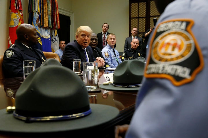 President Donald Trump welcomes Georgia police officers and firefighters at the White House on April 13. The National Fraternal Order of Police backed Trump in the presidential campaign.