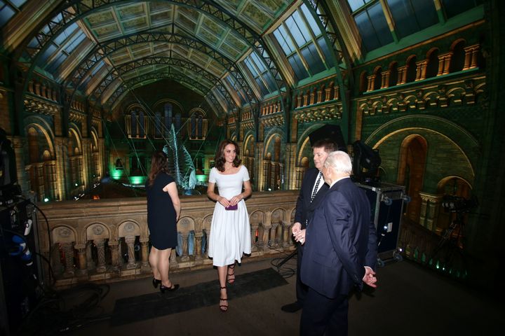 Duchess of Cambridge and David Attenborough are shown a blue whale skeleton by museum director Sir Michael Dixon during the reopening of Hintze Hall at the Natural History Museum in London on July 13, 2017