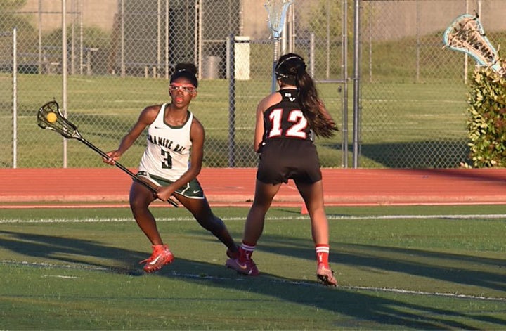 Avonna Usher, left, plays lacrosse for the Granite Bay High School team.