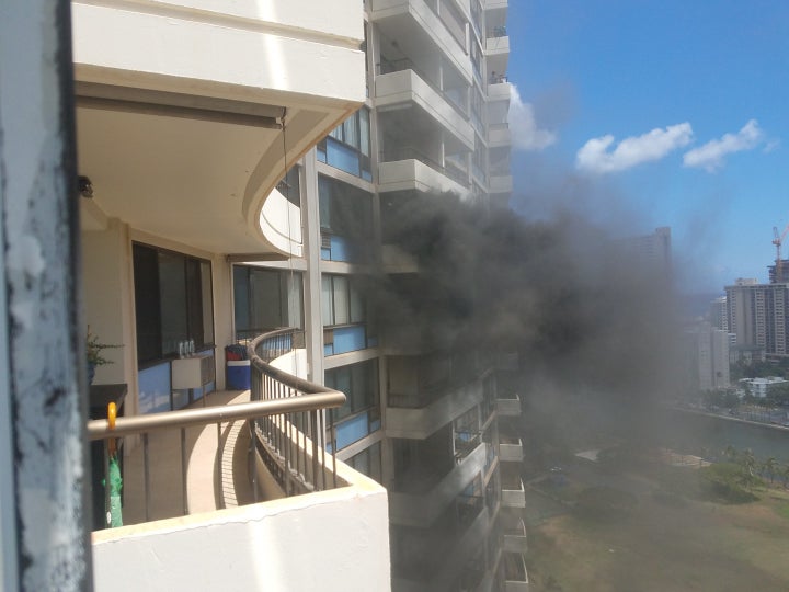 After hearing a fire alarm, Joel Horiguchi looked out from the balcony of his Marco Polo residence and saw thick smoke coming from the floor above him.