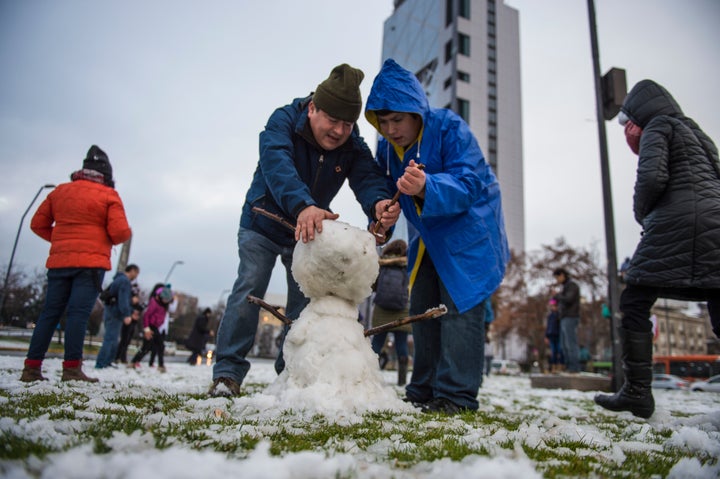 Snowman-building in Santiago on Saturday.