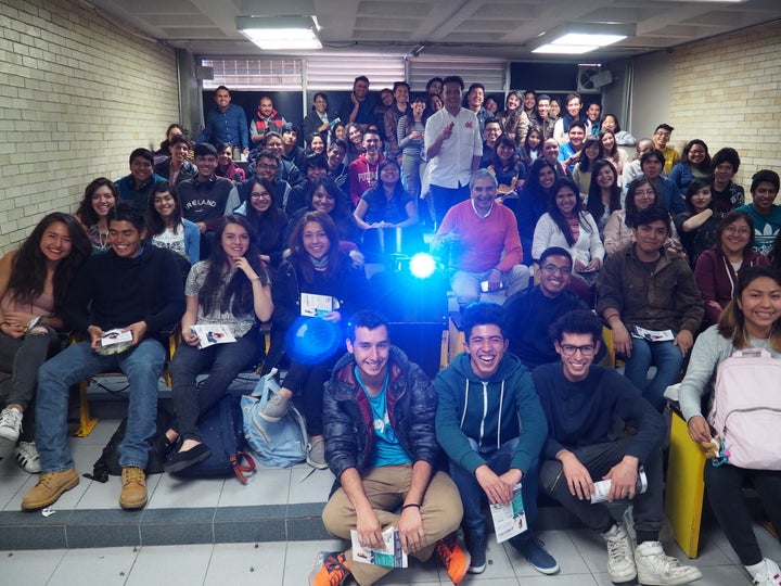 DKT Health Counselor Victor Tapia Orijel (center, white shirt) and a group of high school students who attended his sex talk in the Iztacalco neighborhood of Mexico City.