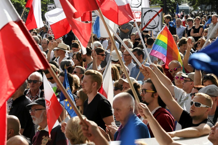 Protesters gather in front of the Parliament building during an opposition protest in Warsaw, Poland July 16, 2017.