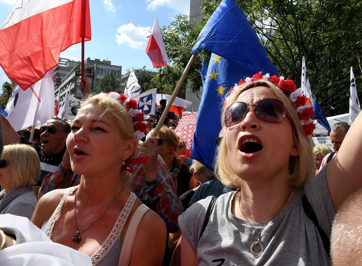 Hundreds of government opponents protest in front of the parliament building in Warsaw, on July 16, 2017.