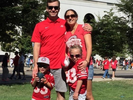 Zach Lawrence with his wife and children.