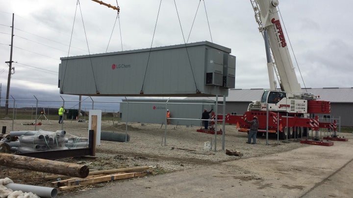 A container of batteries is installed in Minster, Ohio, the first local government to pair energy storage with solar power. G